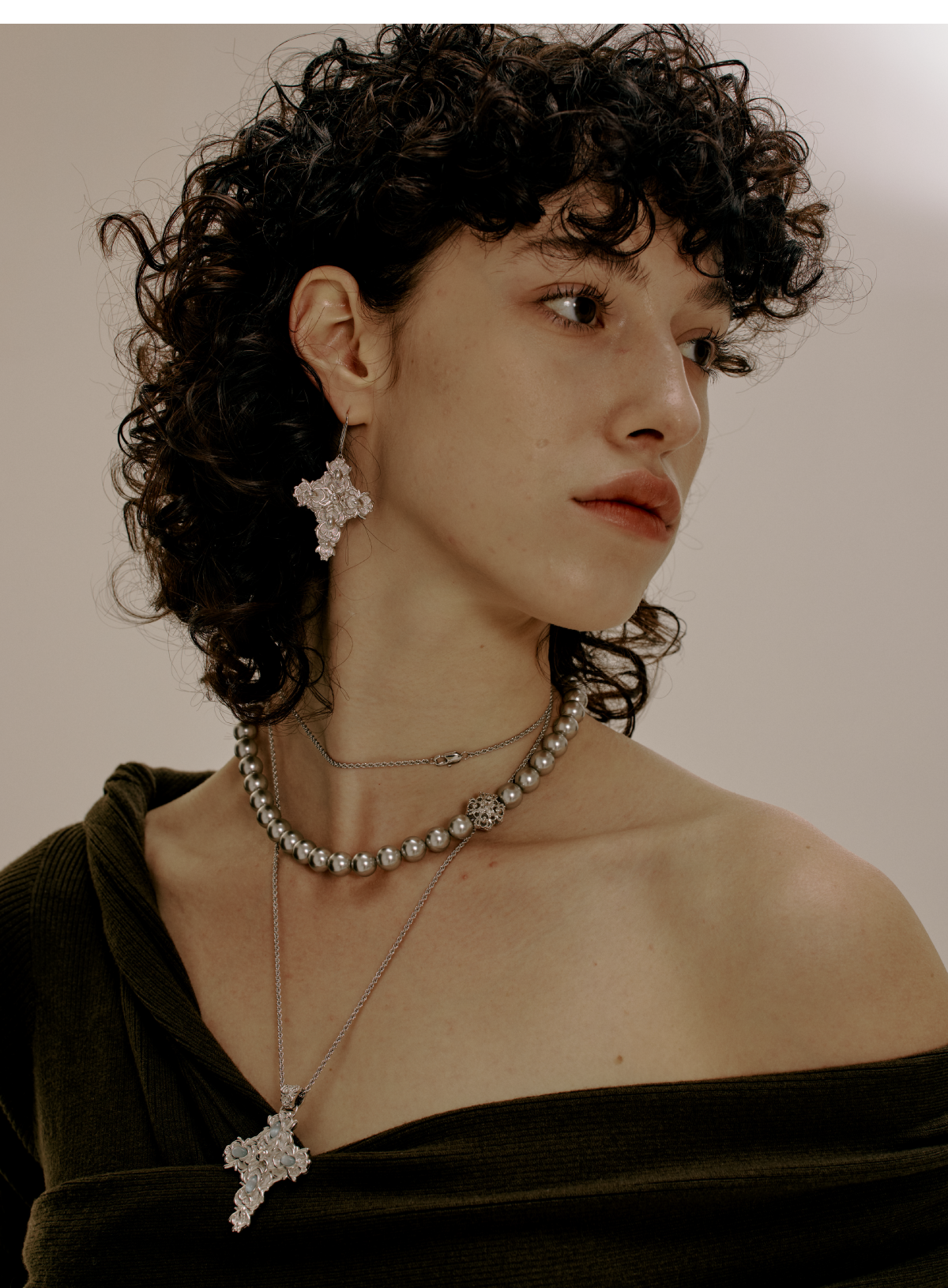 Cross Magnolia shoulder pendants