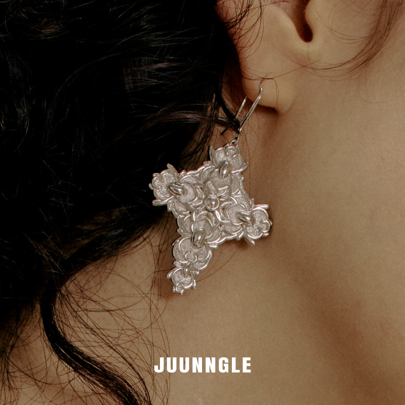 Cross Magnolia shoulder pendants