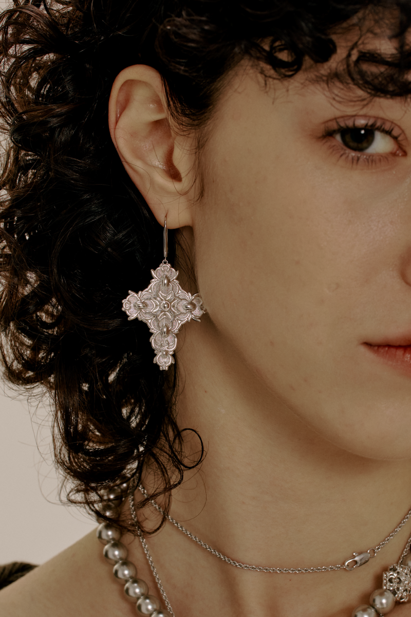 Cross Magnolia shoulder pendants