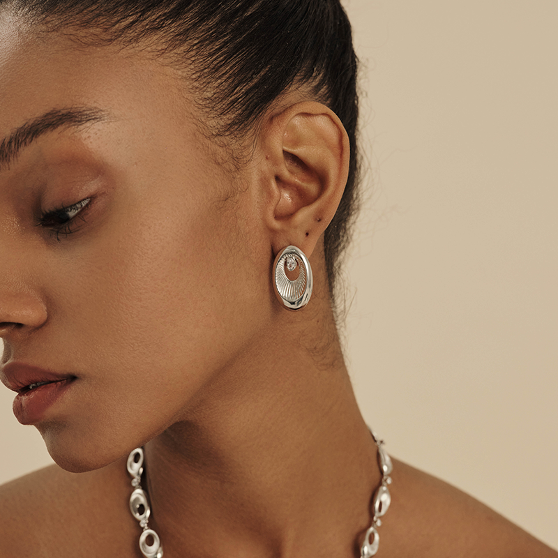 Engraved and patterned stud earrings