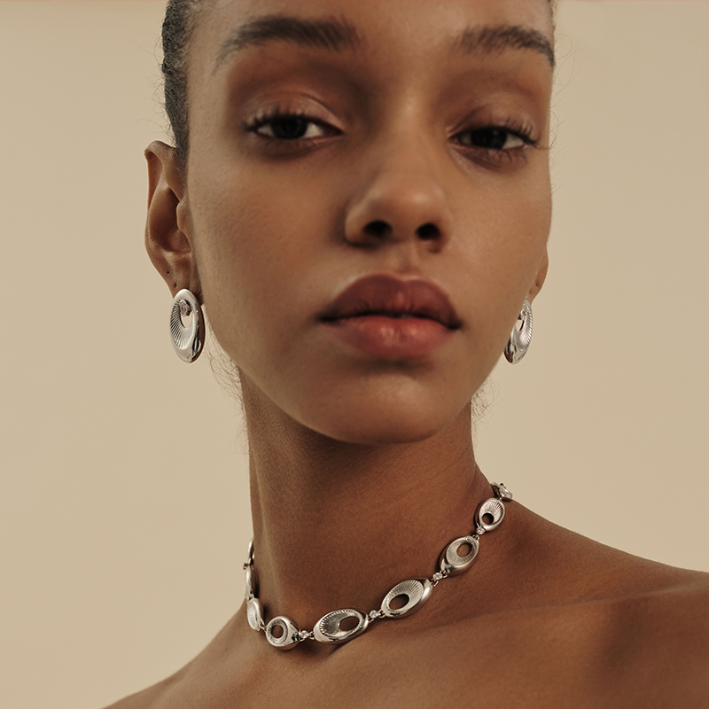 Engraved and patterned stud earrings