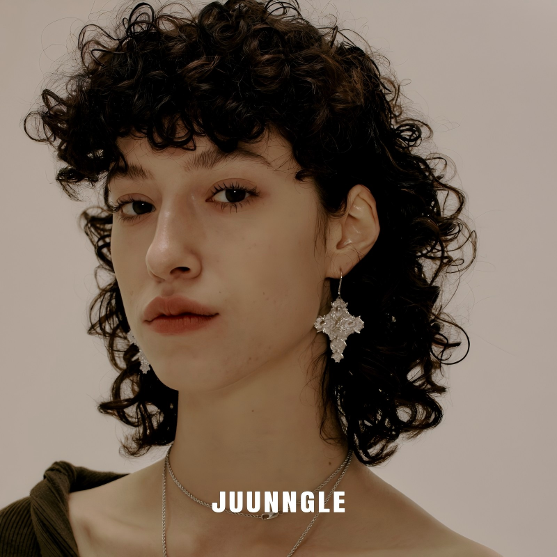 Cross Magnolia shoulder pendants